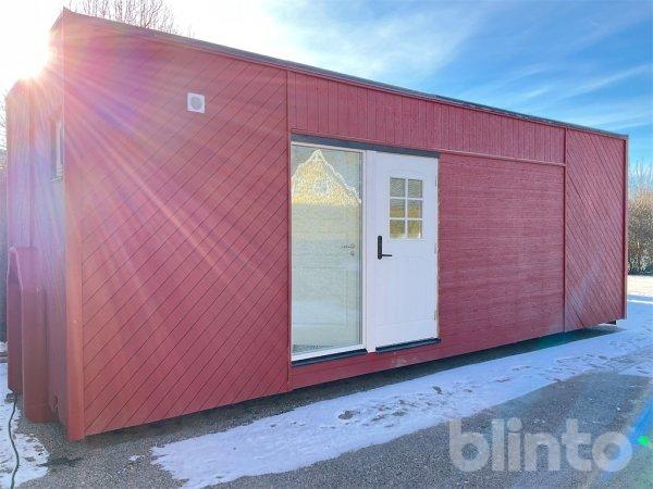 Attefallshus Byggd på lastväxlarram